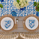 Ginkgo Blue napkins on set dinner plates. 