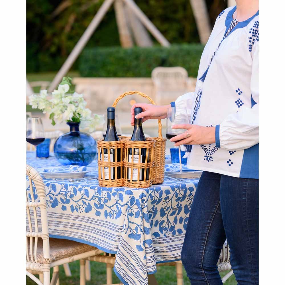 Model carrying wine basket. 