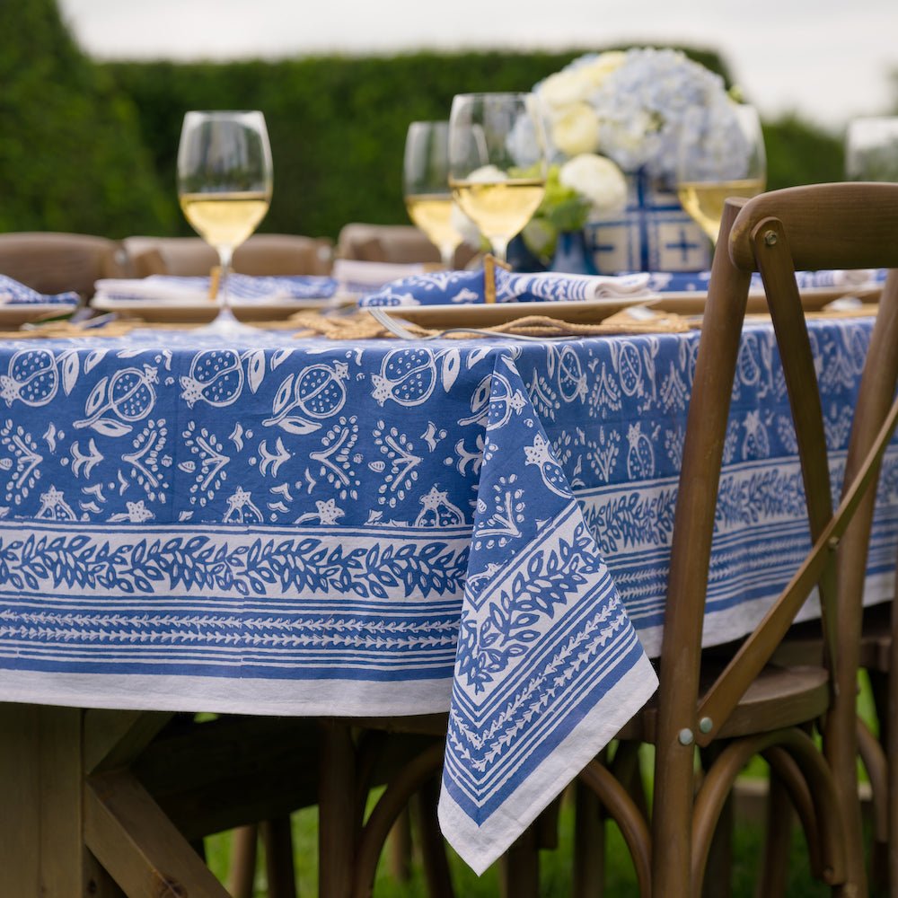 Outdoor table with Pomegranate Blue tablecloth