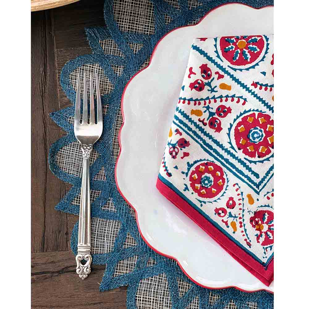 Bukhara Stripe Brick & Teal Napkin with starburst placemat and fork