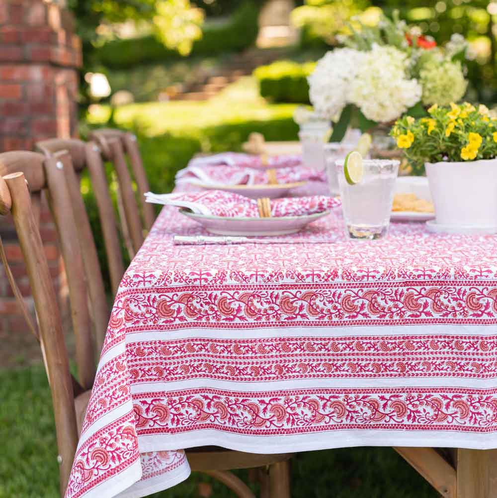 Caroline Red tablecloth place setting with flowers