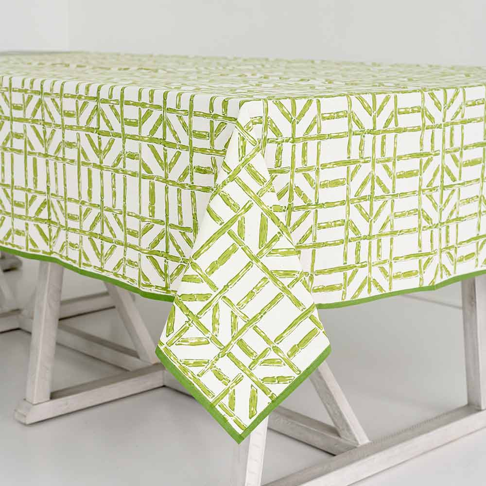 Tablecloth with green and white geometric bamboo pattern. 