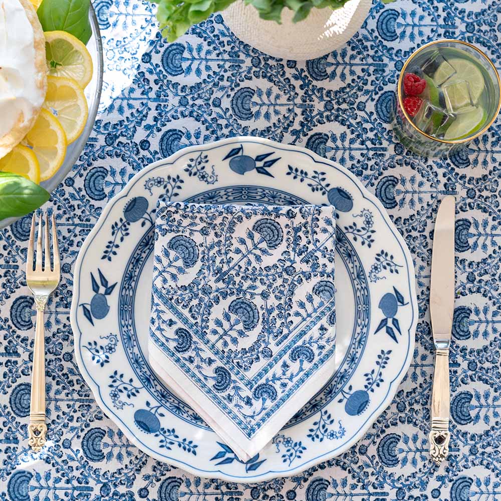 Caroline Blue napkin and tablecloth on a dinner table. 