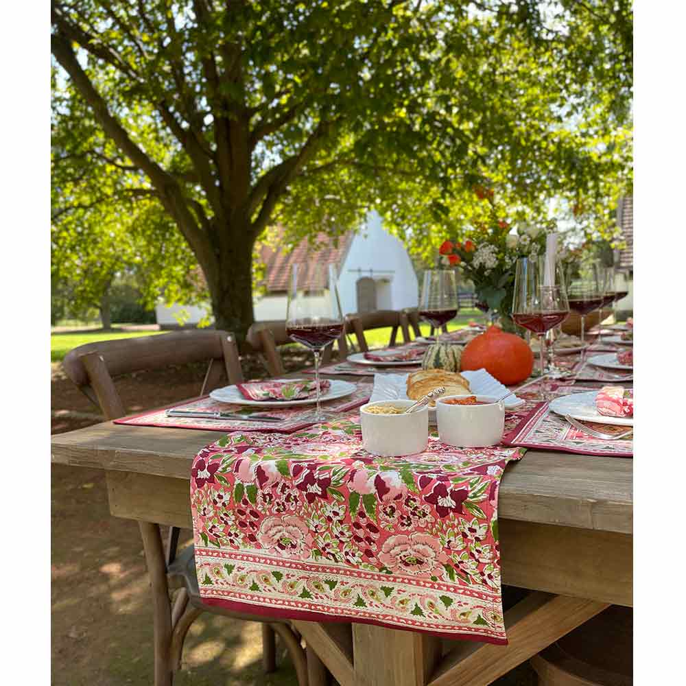 View of table runner with barn in background. 